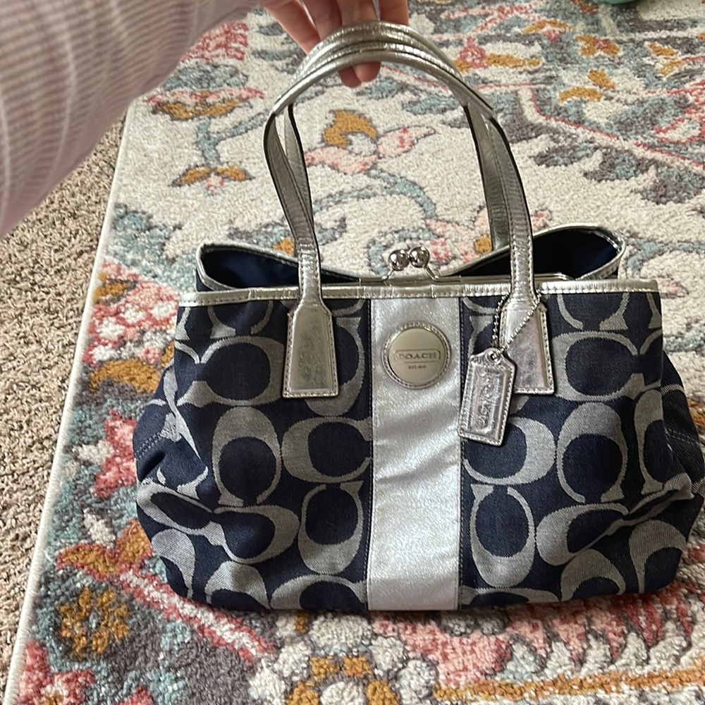 Navy blue and silver Coach purse.